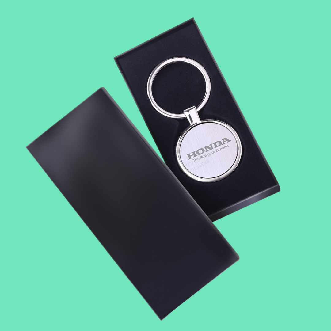 Chaveiro de metal com chapa central redondo