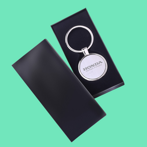 Chaveiro de metal com chapa central redondo